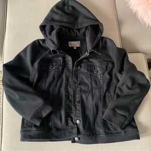 NWOT Torrid Black jean jacket with sweatshirt sleeves.